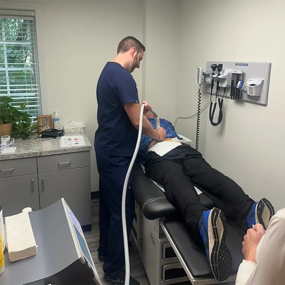 Patient receiving softwave therapy by RevIVe West